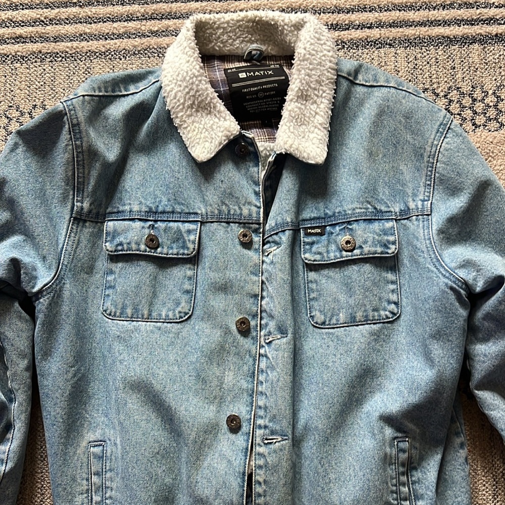 Blue and feather varsity jacket